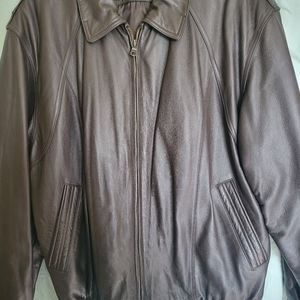 Dark brown, genuine leather winter bomber jacket. Like new.